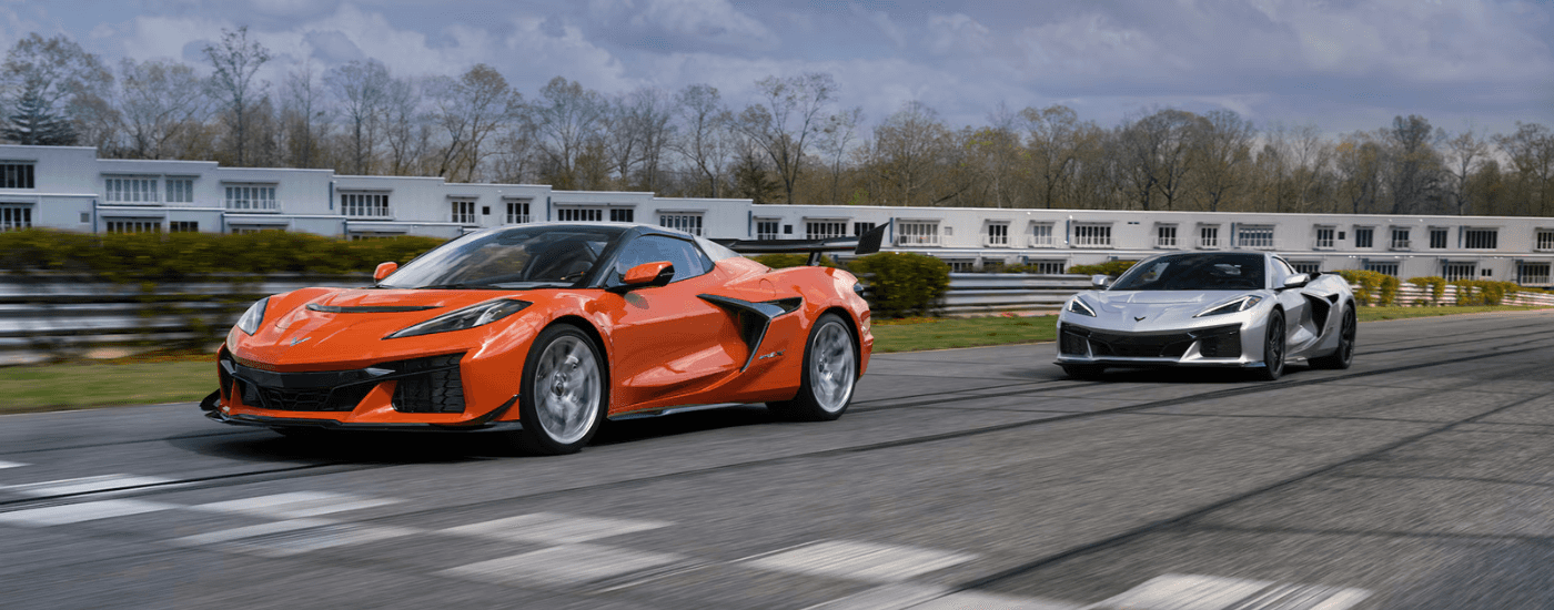 Orange 2026 Chevy Corvette ZR1X with a silver 2026 Chevy Corvette trailing