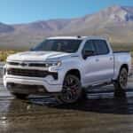 White 2026 Chevy Silverado 1500 Stars and Stripes parked on dirt