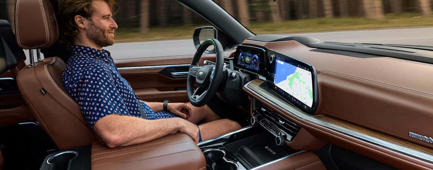 A man using Super Cruise inside a 2026 Chevy Suburban