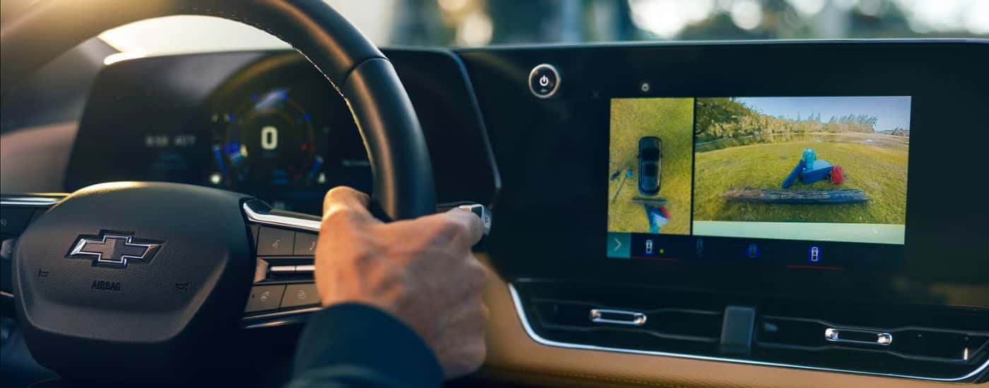 2026 Chevy Equinox with camera views and close up of the steering wheel.