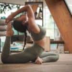 lady doing yoga - best gyms in st. louis
