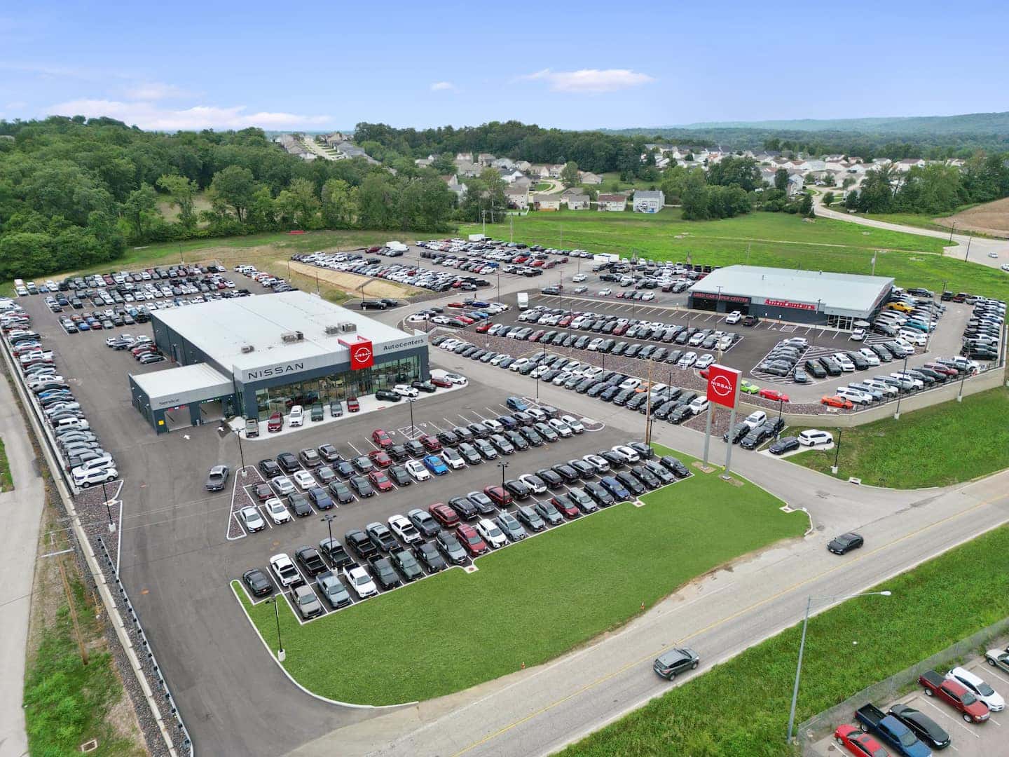 Exterior view of the AutoCenters Nissan dealership Near St. Louis, MO