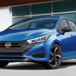 2024 Blue Nissan Versa in Driveway
