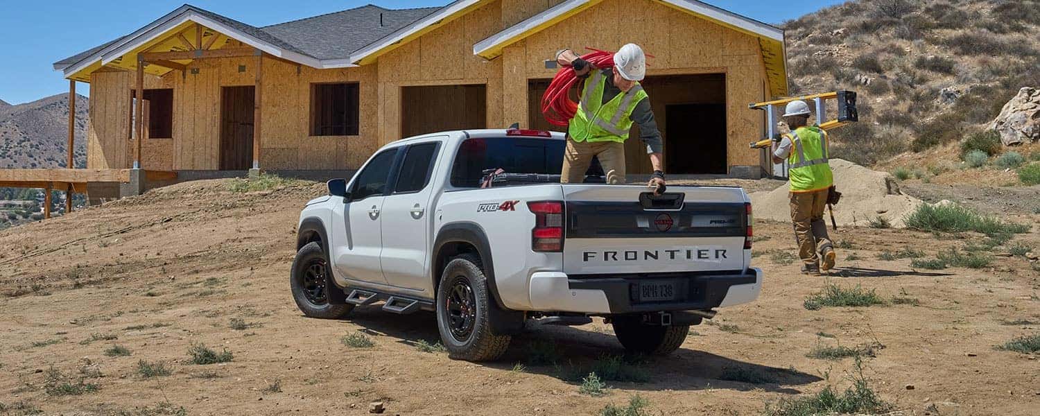 Nissan Frontier work truck at construction job site