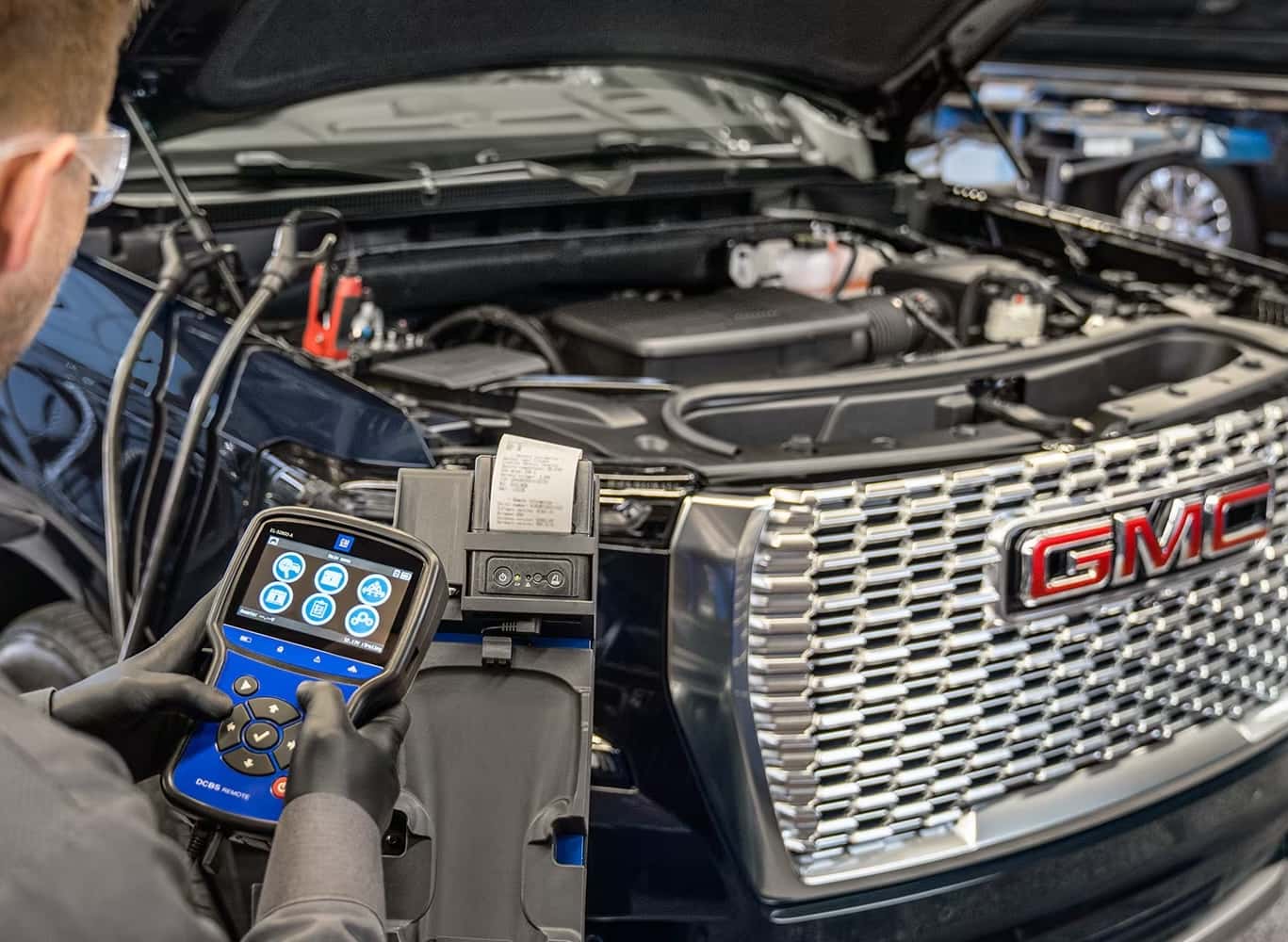 GMC Technician with scan tool