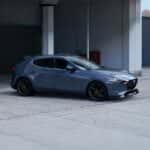 2026 Mazda3 Hatchback pulling out of a parking space