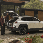 2026 Mazda CX-50 hybrid with people loading rear cargo