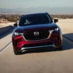 Mazda SUV driving on the road