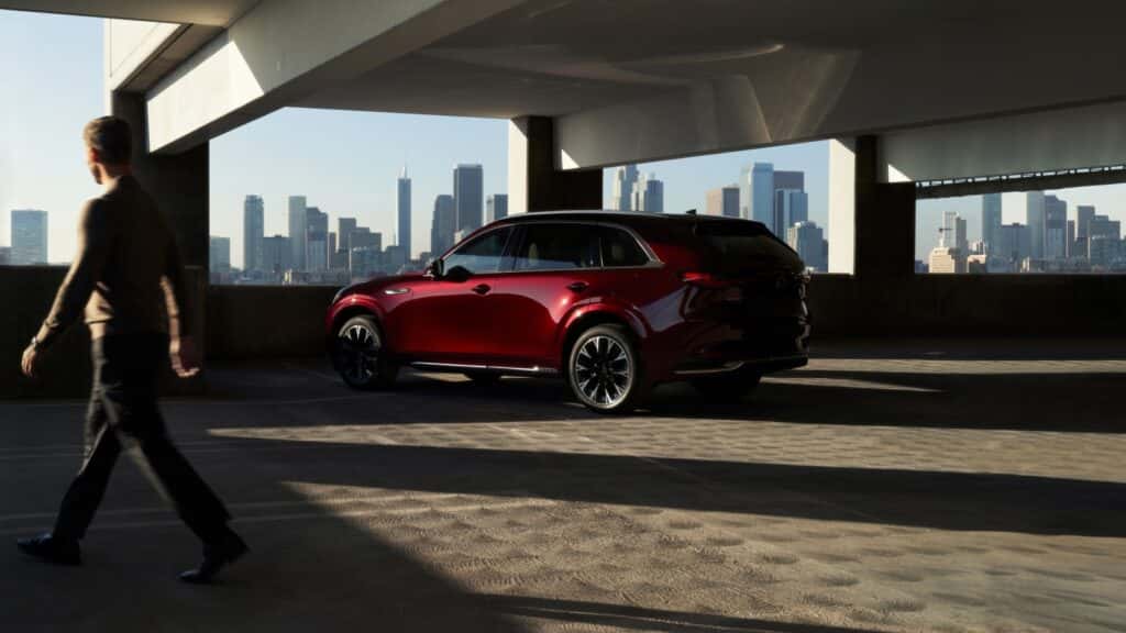 A parked three-row SUV, the Mazda CX-90