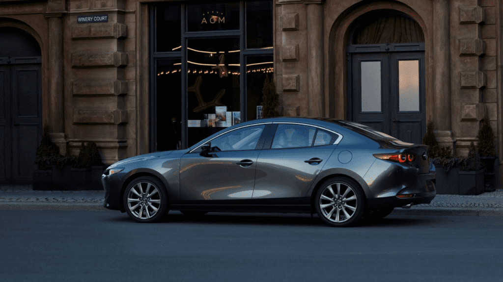 A 2026 Mazda3 Sedan parked in the city