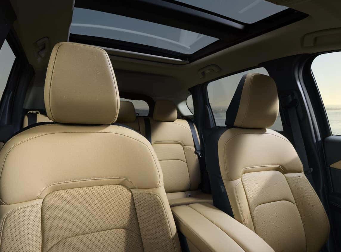 Luxurious interior of the 2026 Mazda CX-5 2.5 S Premium with panoramic moonroof and leather-trimmed upholstery