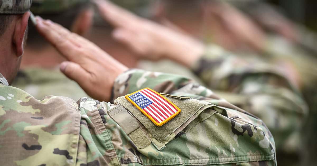 Soldiers saluting, representing the Mazda military discount
