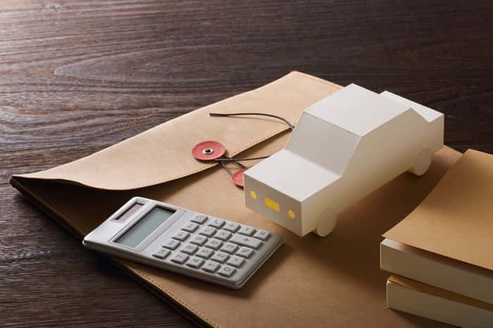 Mazda financing materials on a desk