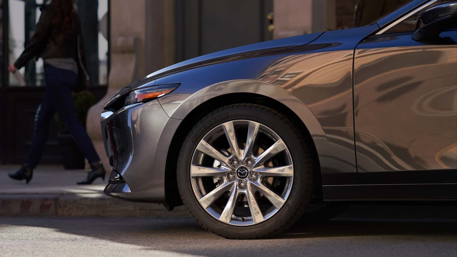A new Mazda sedan parked in the city