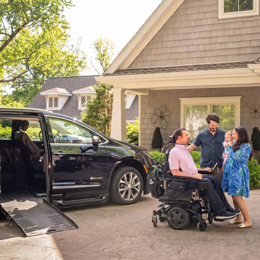 Family Loading a Wheelchair Into an Accessible Van