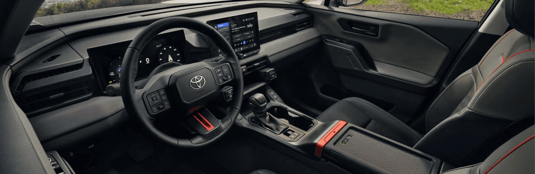 2026 RAV4 Plug-in Hybrid dashboard with 12.9-in. Toyota Audio Multimedia display