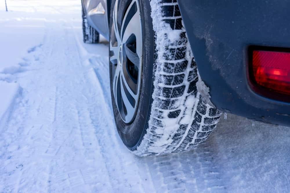 Attention winter tires in winter when there is snow symbol image
