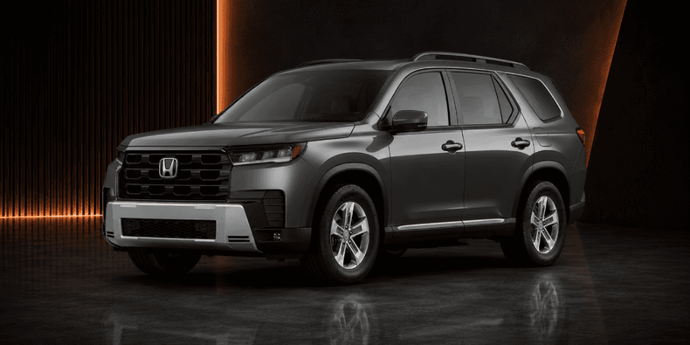 Honda Pilot three-row SUV in gray studio setting
