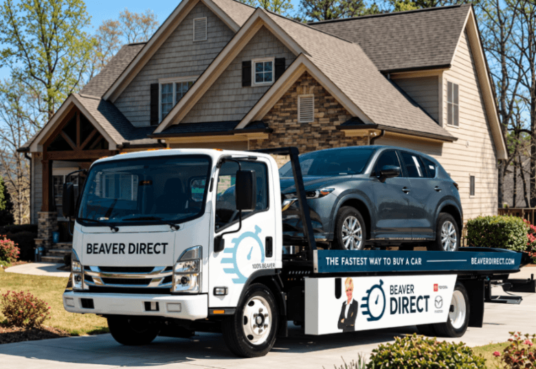 Beaver Mazda Direct delivery truck transporting a Mazda SUV to a customer's home