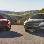 2026 Genesis GV70 SUV exterior shot in luxury showroom setting - 2026 Genesis GV70 SUV