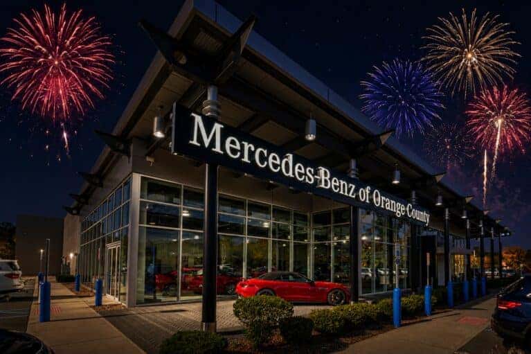 dealership with fireworks in background
