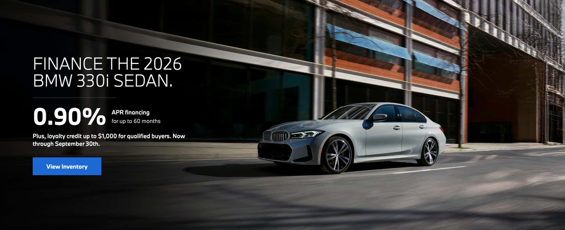 2026 BMW 330i luxury sedan driving through the city featuring 0.90% APR financing for up to 60 months plus up to $1,000 BMW Loyalty Credit at BMW of Myrtle Beach through September 30.