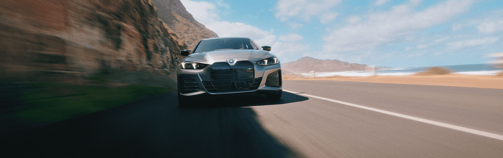 2023-BMW-i4-charging-up-while-parked-by-the-bay