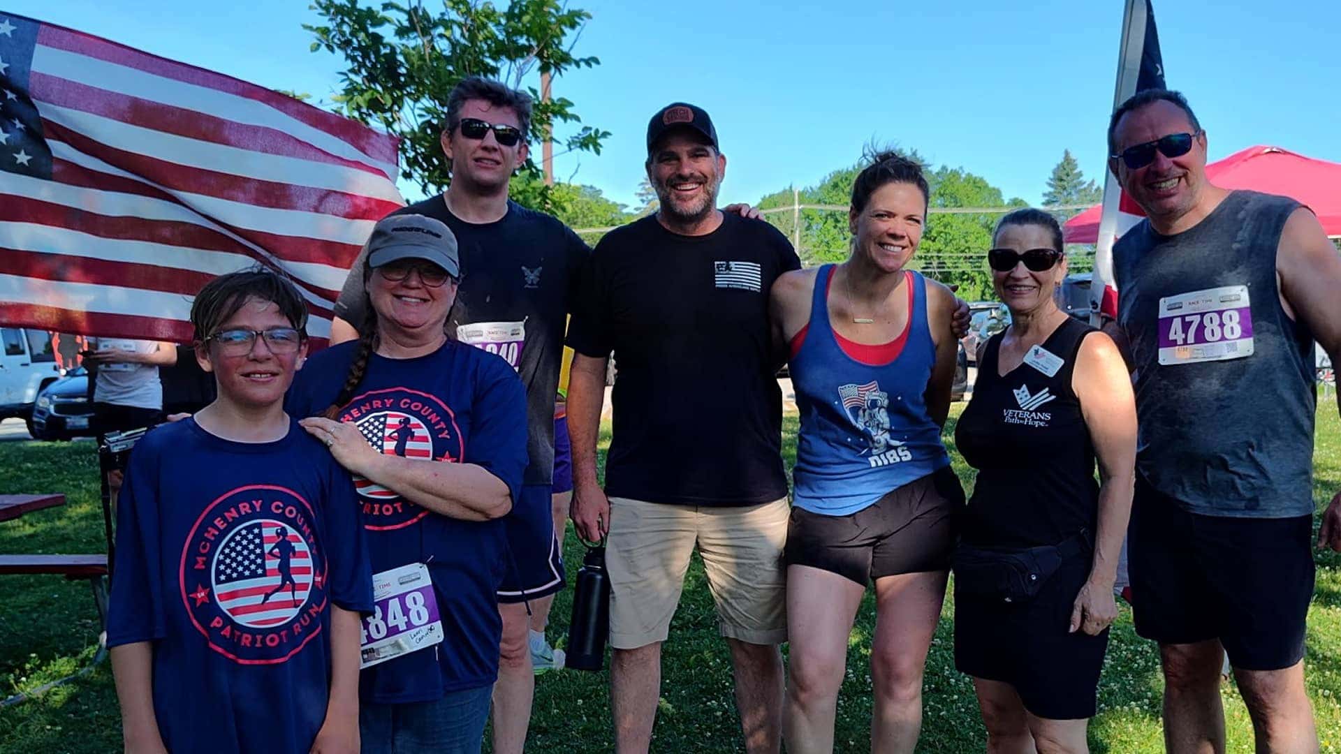 group standing by flag