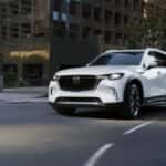 2026 Mazda CX-90 Inline 6 Turbo driving on city street