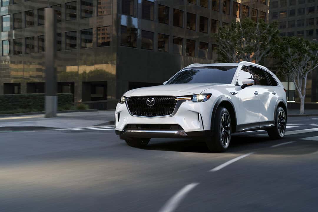 2026 Mazda CX-90 Inline 6 Turbo driving on city street