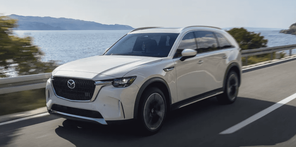 2026 Mazda CX-90 PHEV running on street