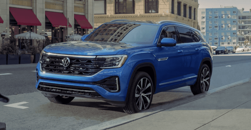 2026 Volkswagen Atlas Cross Sport SUV parked along an urban street