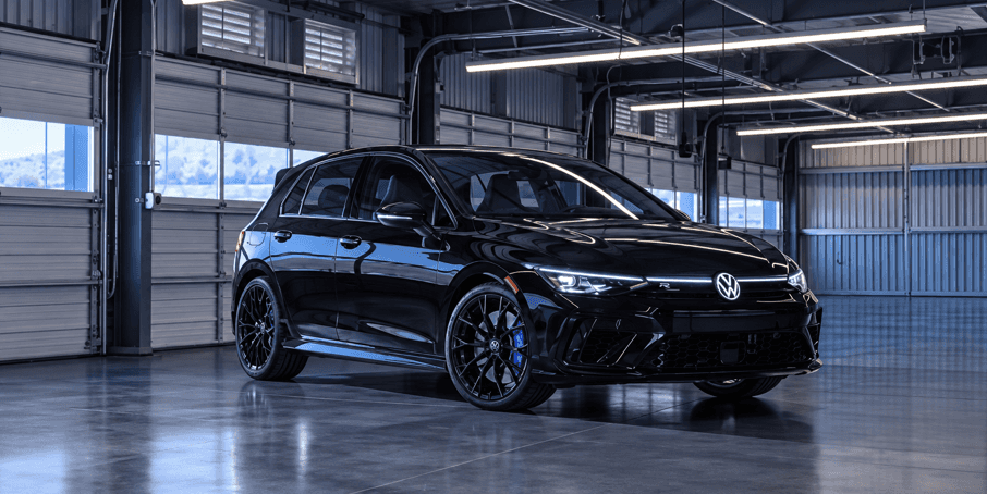 Volkswagen Golf R parked inside modern garage