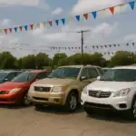 Used car lot with trucks and SUVs at CarHop dealership – affordable financing options for pre-owned vehicles across the U.S.