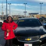 carhop customer with their new car