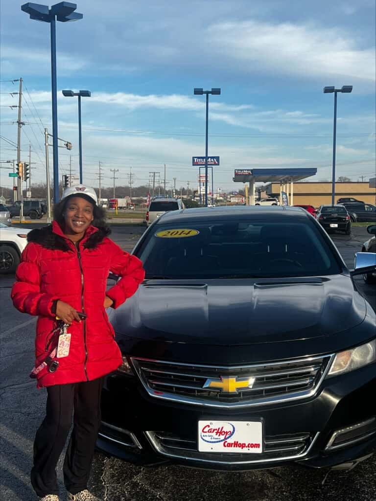 carhop customer with their new car