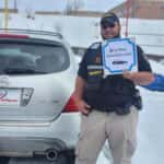 customer with their new car at carhop