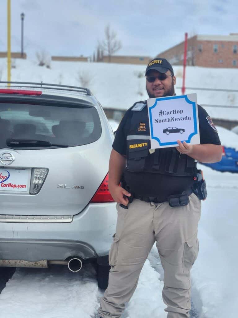 customer with their new car at carhop