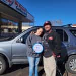 customers with their suv at carhop