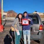 carhop customer with their new car