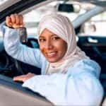 woman holding keys