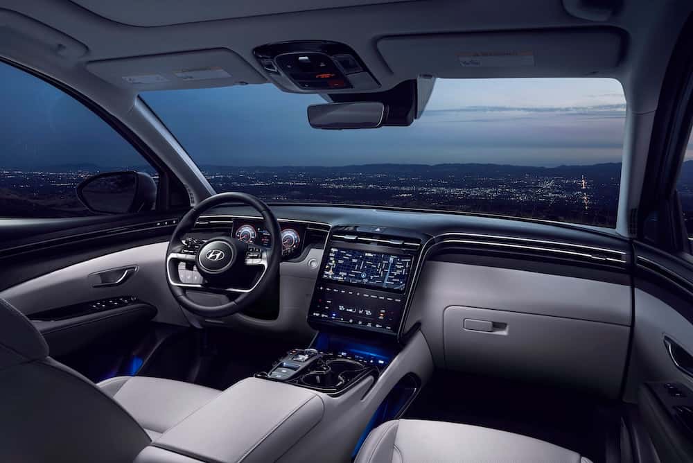 Hyundai Tucson Hybrid interior with digital gauge cluster and touchscreen