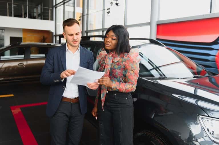 People Discussing Car Payments