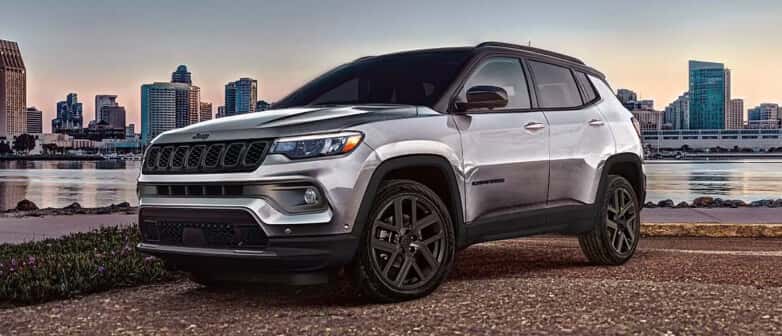 2026 Jeep Compass Limited Altitude in Red Hot in three quarter.