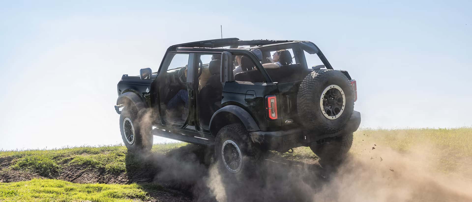 a 2026 Ford Bronco driving up a hill