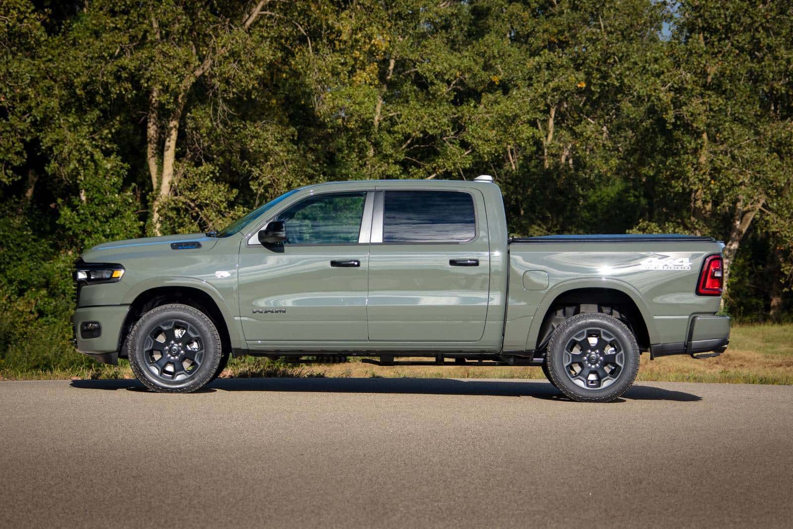 2026 Ram 1500 parked next to a forest
