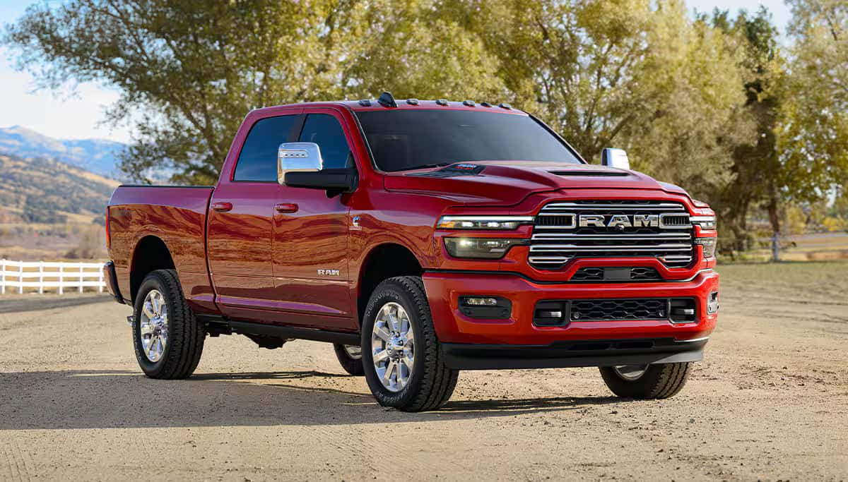a 2026 Ram 2500 parked next to a tree