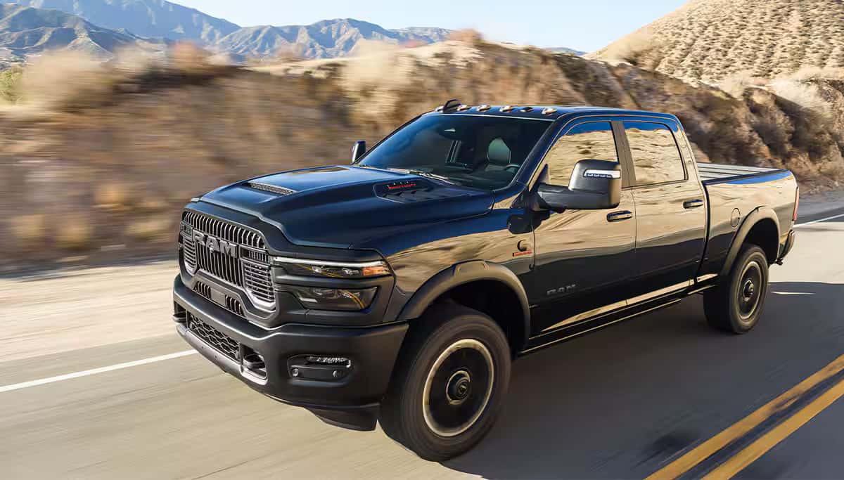 a 2026 RAM 2500 driving on a road