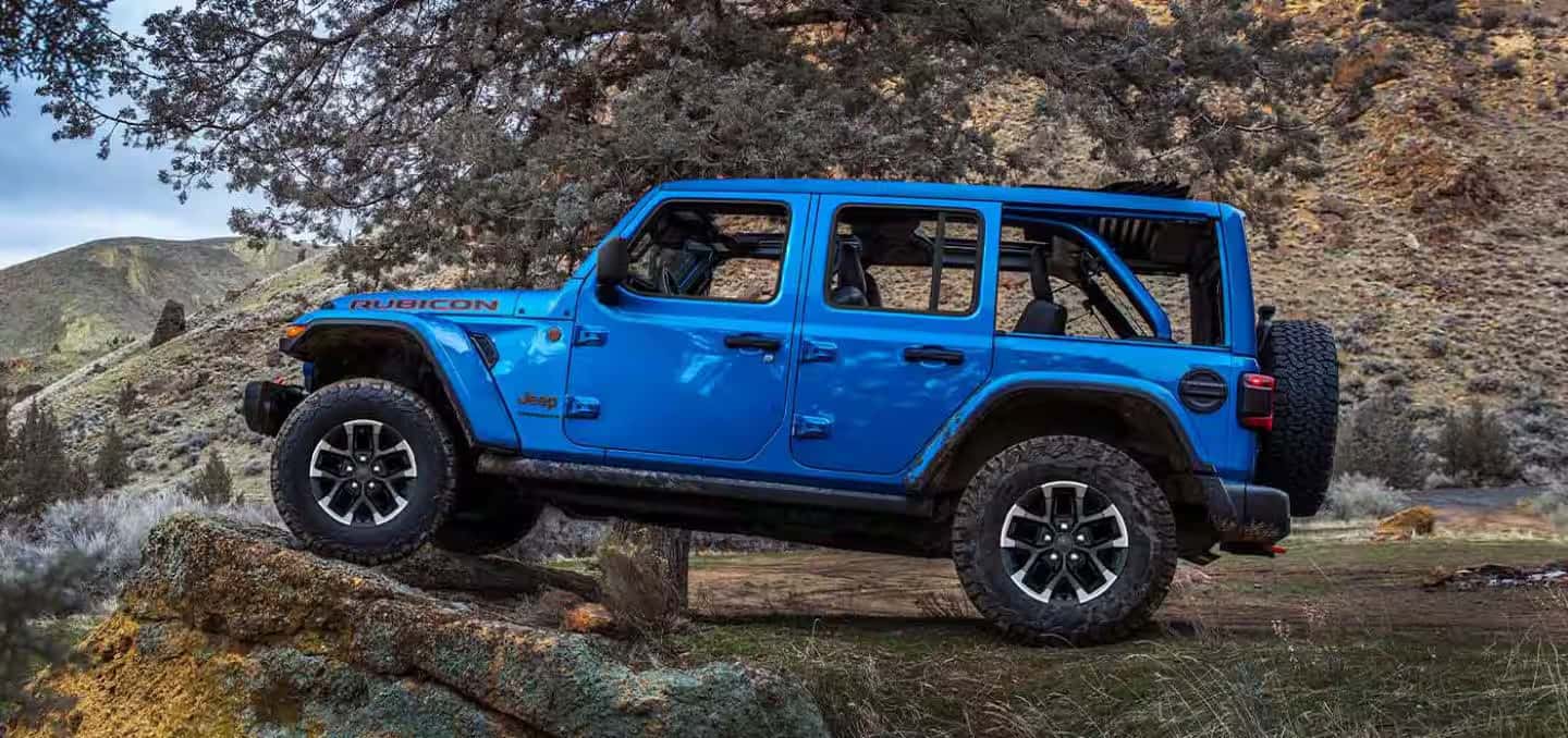 2026 Jeep Wrangler parked on a cliff