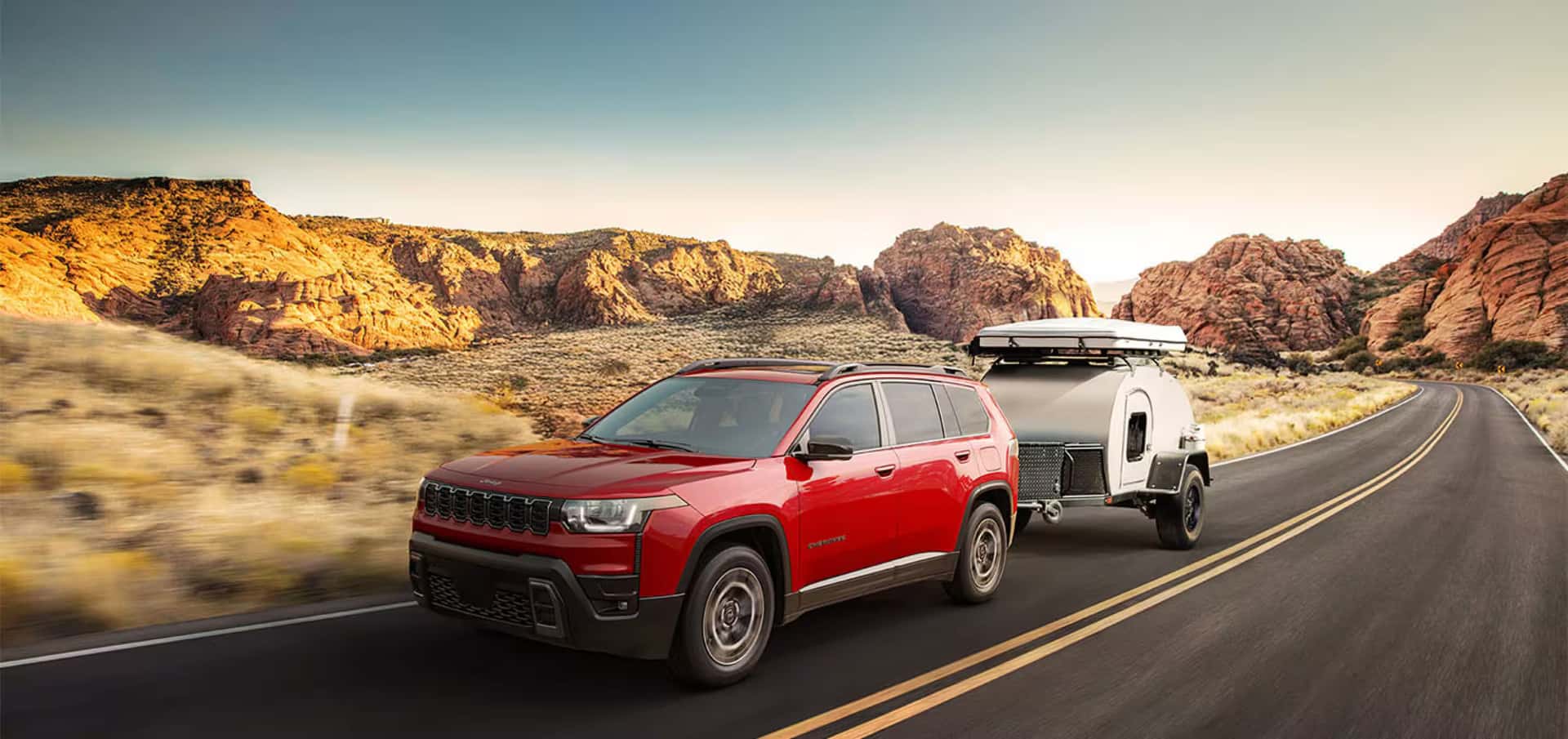 2026 Jeep Cherokee towing a camper